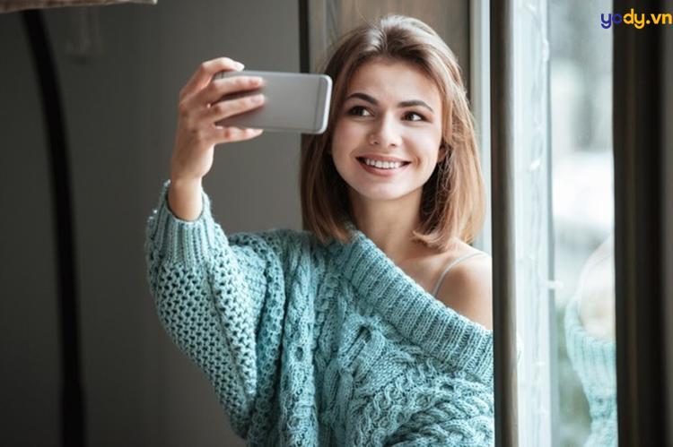 khuôn mặt bị lệch khi chụp ảnh